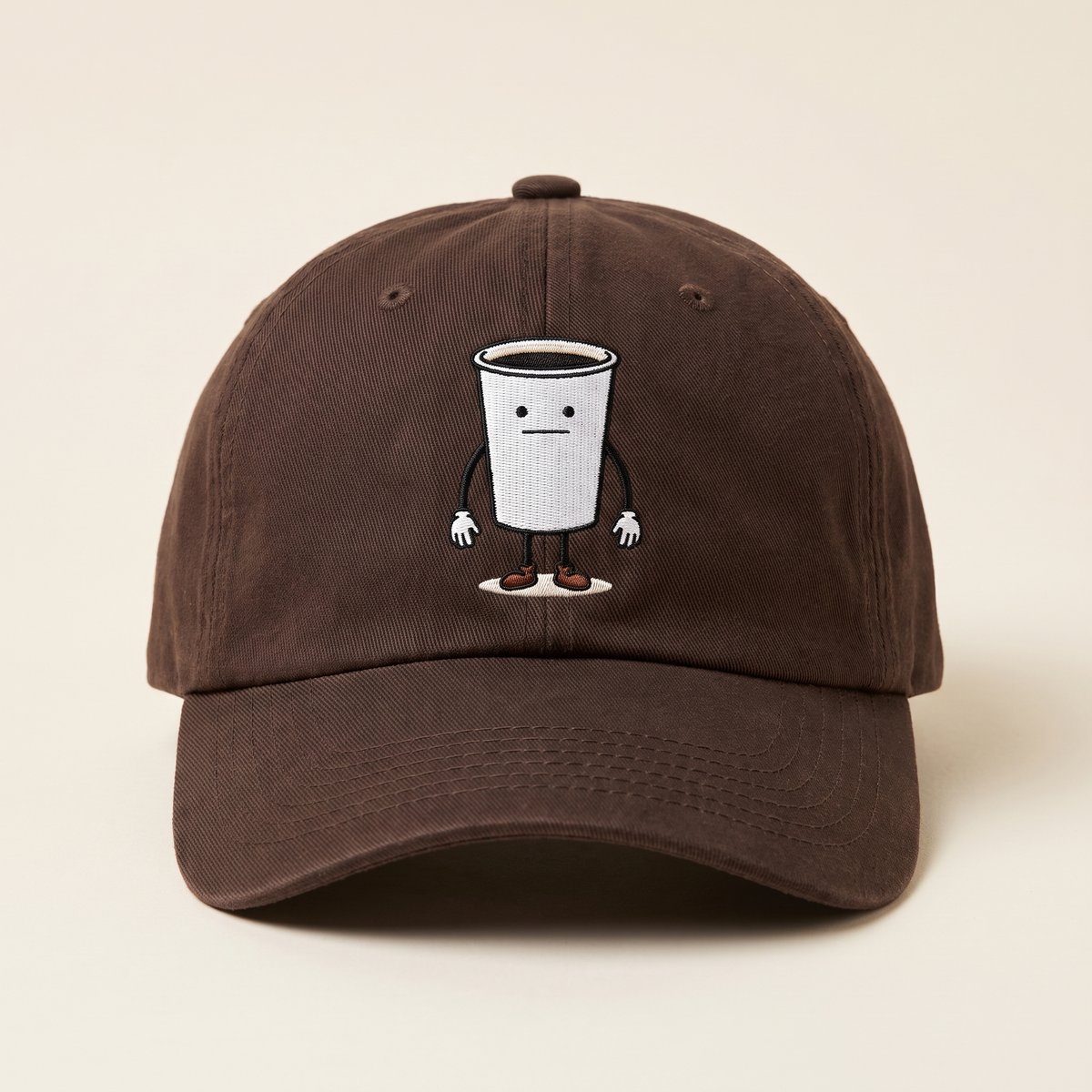 Dark brown unstructured dad cap with a small embroidered Drip on the front.